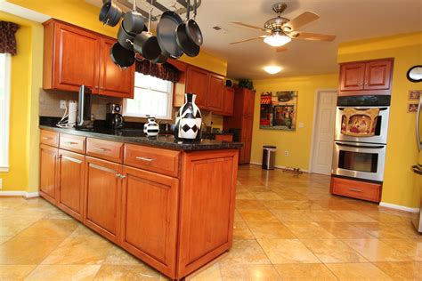 kitchen with oak cabinets and stainless steel appliances|update golden oak cabinets.